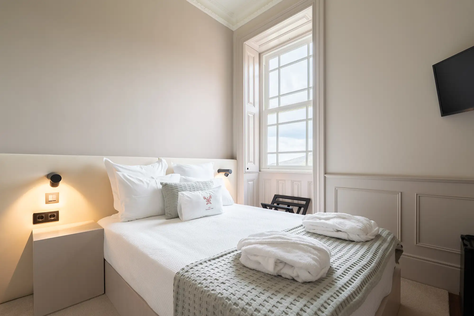 Cama do Quarto Noronha Lima Boutique Hotel